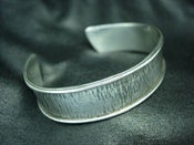 Image of 'wood effect' cuff