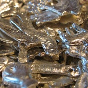 Image of Shiny Silver Milagros - Medium Size