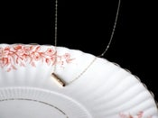 Image of gold barrel necklace