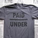 Image of Underpaid (asphalt)
