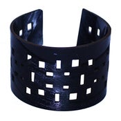 Image of Square Dot Bracelets cut out of recycled BLACK and RED vinyl records.