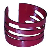 Image of Waves Bracelets cut out of recycled BLACK and RED vinyl records.
