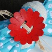 Image of Red Waxed Flower, a fair trade, coconut shell accessory