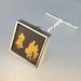 Image of Brass People on Slate Tie Pin