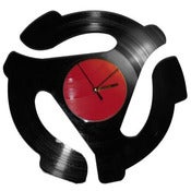 Image of 45 Adapter Clock made from recycled vinyl records.