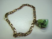 Image of Bow tea cup charm bracelet