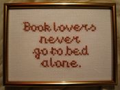 Image of 'Book Lovers Never Go To Bed Alone' embroidered picture 5x7 in.
