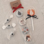Image of pins for four