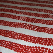 Image of Pebbles on hemp/organic cotton - red