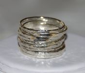 Image of Set of 9 handmade hammered sterling silver stackable rings, sizes 5, 6, 7, 8, 9, 10, 11