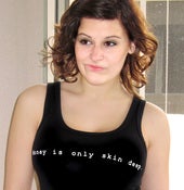 Image of money is only skin deep - tank