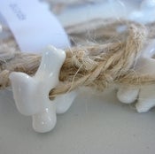 Image of bird garlands - light jute