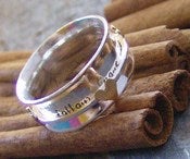 Image of follow your heart sterling and brass spinner ring