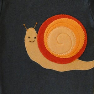 Image of SNAIL ONESIE