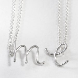 Image of sterling silver handwritten initial necklace