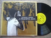 Image of ...A Peaceful Riot... vinyl record