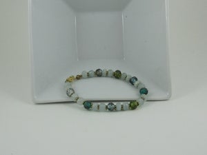 Image of Aquamarine trimmed out in gold