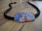 Image of RECYCLED LENS NECKLACE