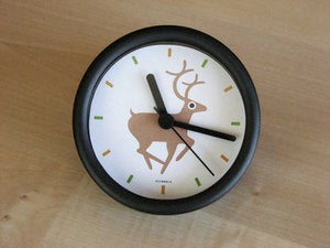 Image of deer in the headlights desk clock
