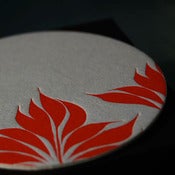 Image of simple red flower pattern, coasters set of 8