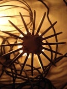 Image of flickery industrial cage light | 2 x 60W | black cage