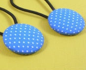 Image of blue and white polka dot pony tail holders 