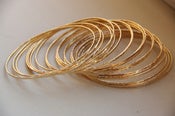 Image of Set of 5 thin / skinny / tiny  14k gold filled handmade hammered stackable / stack bangles / bracele