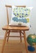 Image of ballooning cushion on white cotton barkcloth
