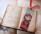 Image of Little Brown Sleeping Wolf - Deluxe laminated bookmark