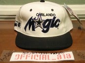 Image of VINTAGE ORLANDO MAGIC SCRIPT LOGO SPORTS SPECIALTIES SNAPBACK CAP HAT