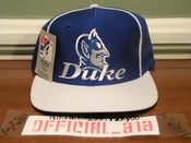 Image of VINTAGE DUKE BLUE DEVILS LOGO THE GAME SNAPBACK CAP HAT