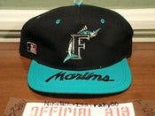 Image of VINTAGE FLORIDA MARLINS LOGO TEXT SPORTS SPECIALTIES SNAPBACK CAP HAT