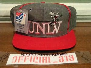 Image of VINTAGE UNLV RUNNING REBELS TEXT LOGO THE GAME SNAPBACK CAP HAT