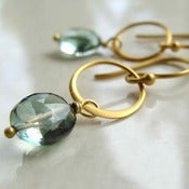 Image of sona earrings with mystic topaz
