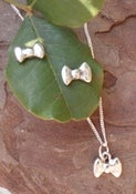 Image of bow earrings and matching pendant
