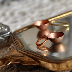 Image of knitter's charm. 'tea time' stitch marker charms.