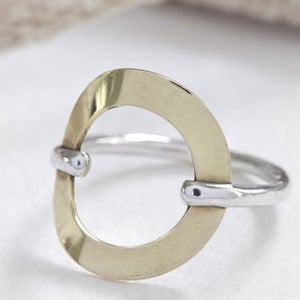 Image of sterling silver and 18k gold karma ring