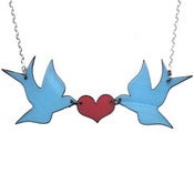 Image of Ltd. Edition Kissing Swallows Necklace made from recycled vinyl records.