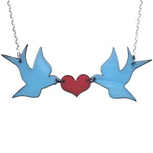 Image of Ltd. Edition Kissing Swallows Necklace made from recycled vinyl records.