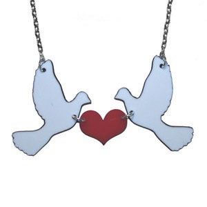 Image of Ltd. Edition Kissing Doves Necklace made from recycled vinyl records.