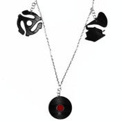 Image of Record/Gramaphone/45 Adapter Charm Necklace made from recycled vinyl records.