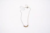 Image of cast brass necklace