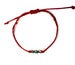 Image of Red String Bracelet with Three Circles Charm