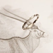 Image of palladium 2mm floral carved
