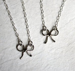 Image of Tiny Sterling Silver Bow Necklace