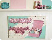 Image of cupcakes baked fresh daily wood sign