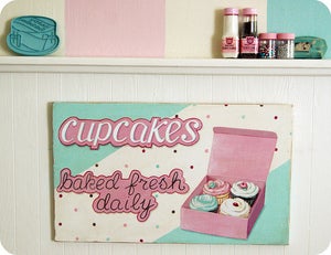 Image of cupcakes baked fresh daily wood sign