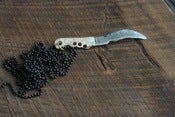 Image of machete pendant