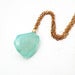 Image of Aqua Necklace in Brass and Chalcedony