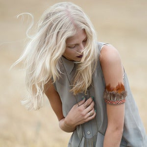 Image of Padma. Feather Armlet